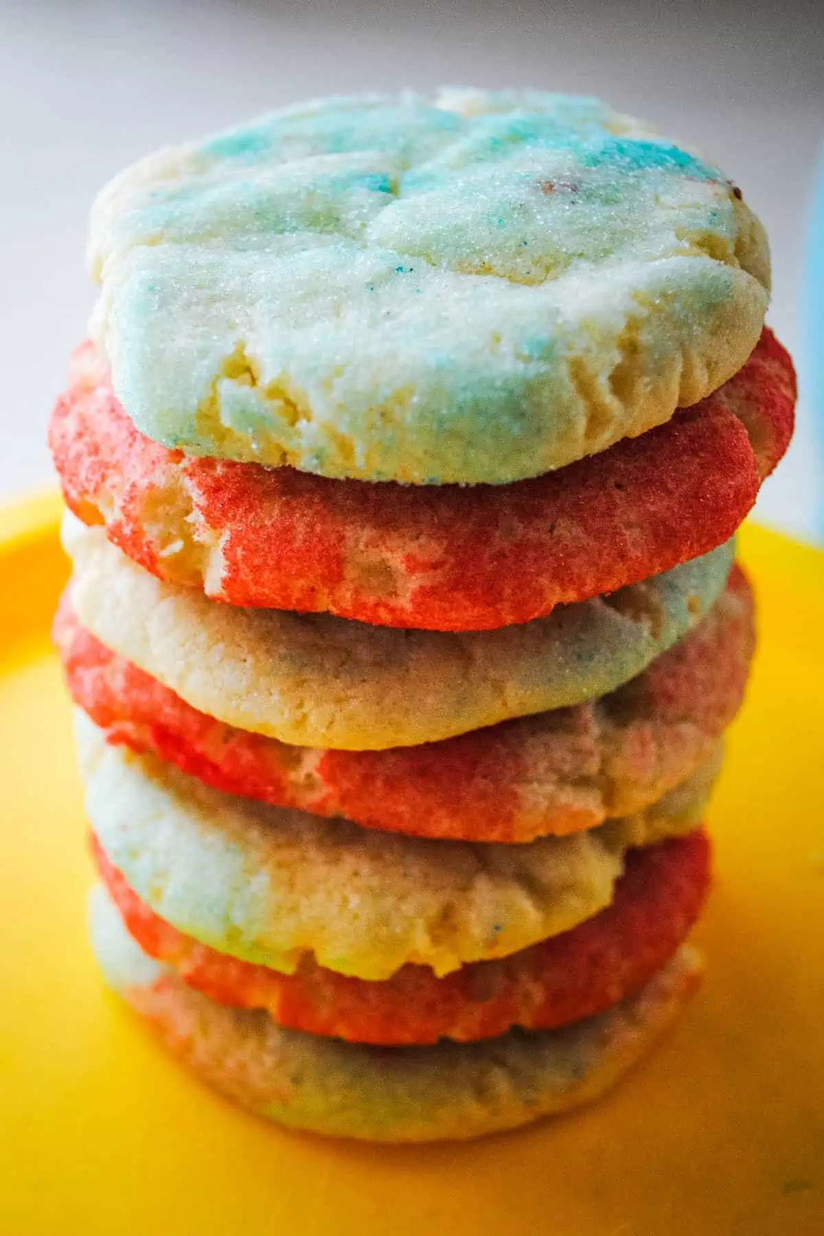stack of Jello sugar cookies on yellow plate