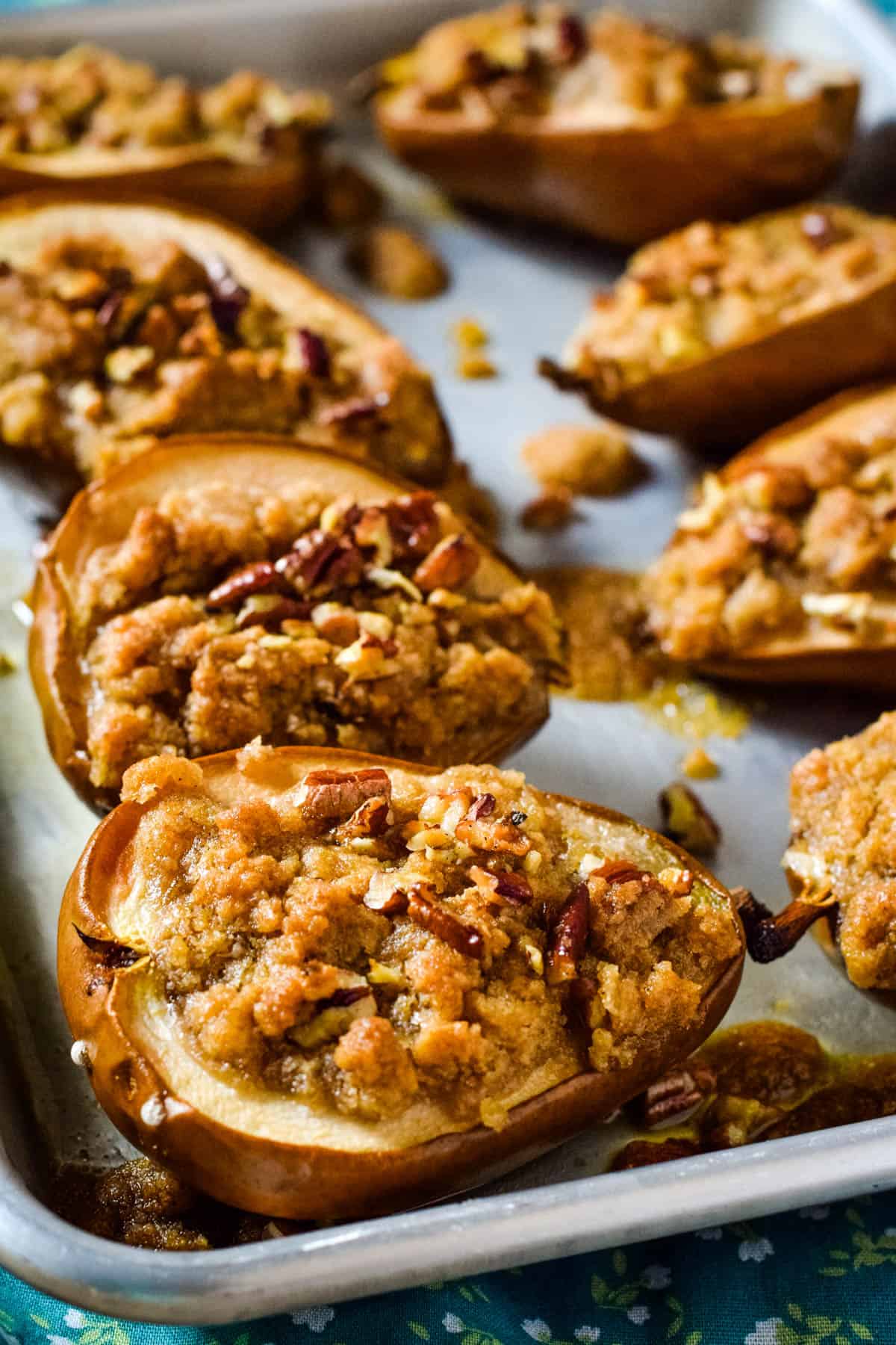 Individual Pear Crisps cinnamon baked pears on baking sheet