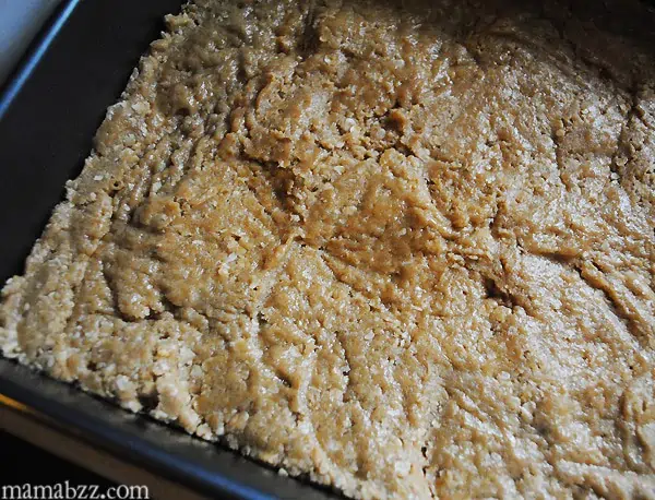Spread peanut butter fingers dough in pan