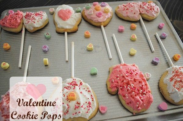 Valentine's sugar cookie pops on baking sheet