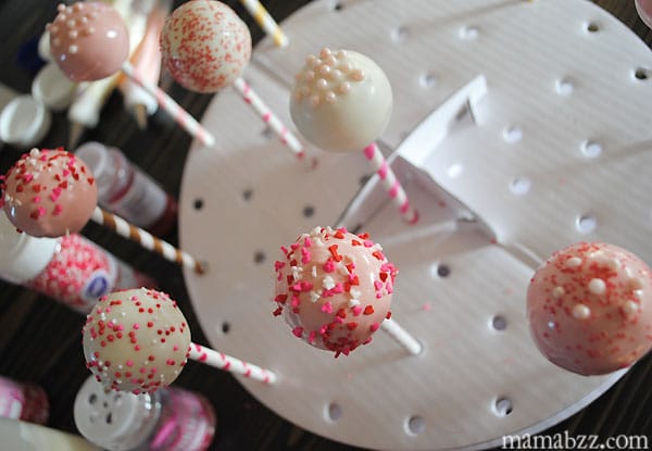 Add decorated cake pops to Wilton cake pop stand