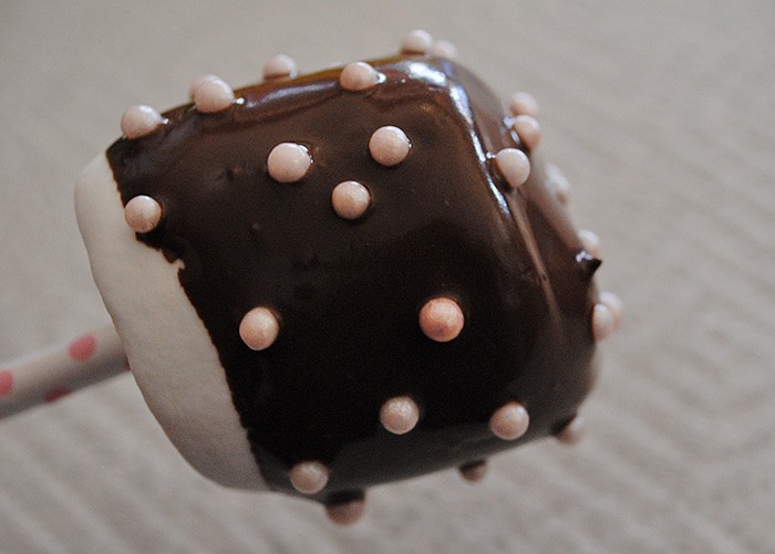 chocolate dipped marshmallow with pink bead sprinkles