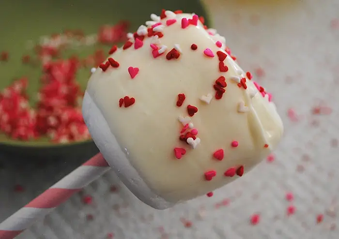 Valentine dipped marshmallow with white candy coating and tiny heart sprinkles