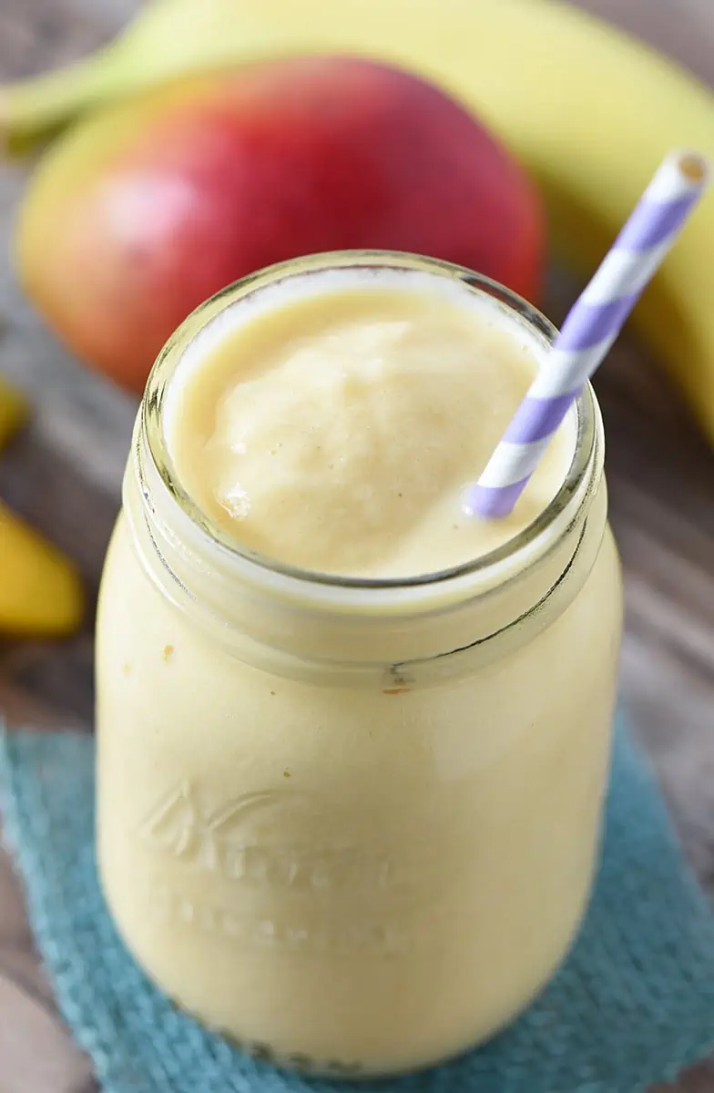 My middle child loves a good smoothie, and this Peach Mango Smoothie is one of our favorite frozen treats. We make it as an afternoon snack, using a banana and a little bit of honey to sweeten the deal.