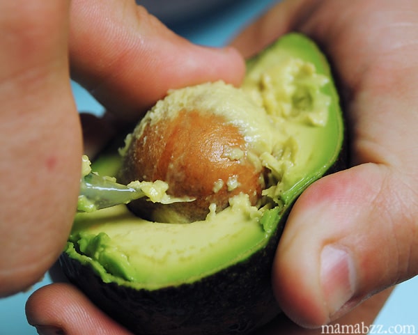Removing the pit from the avocado