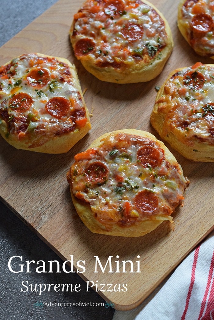 Grands Mini Supreme Pizzas are a quick and easy dinner recipe with Grands Biscuits, pizza sauce, veggies, cheese, and pepperoni.