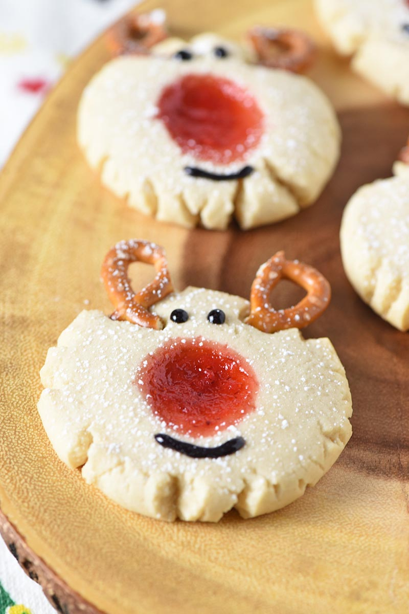 Christmas reindeer thumbprint cookies on log platter