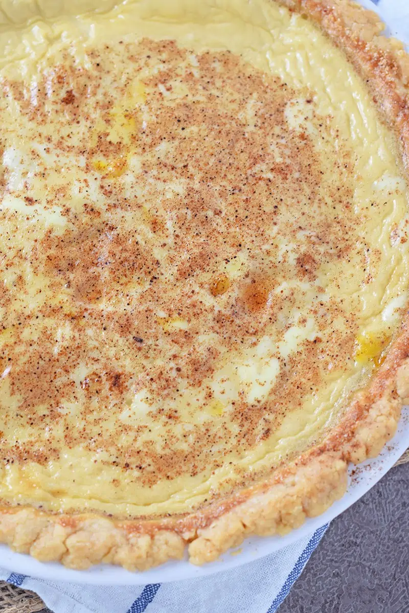 There’s nothing quite like Caramel Custard Pie, warm from the oven. Dreamy creamy egg-based dessert recipe with a brown sugar caramel twist.