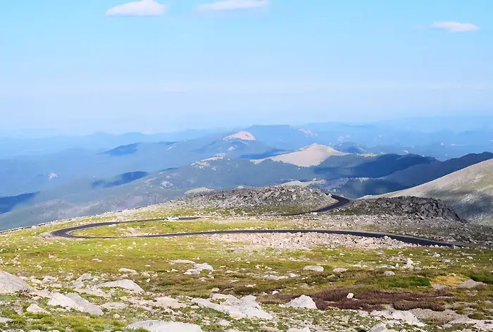 Just beyond Denver, outside Idaho Springs, stands beautiful Mount Evans, a 14,265′ beast of a mountain in the Front Range of the Colorado Rocky Mountains. Travel the highest paved road in North America, the road to the summit of Mount Evans in Colorado.