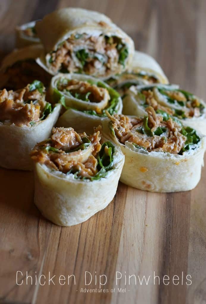 We may enjoy the commercials more than the actual game, but when it comes to Superbowl food or Game Day snacks, these chicken appetizers have got it goin’ on. Chicken Dip Pinwheels pack a flavor-filled punch and make the perfect bite-sized party appetizers or snacks.