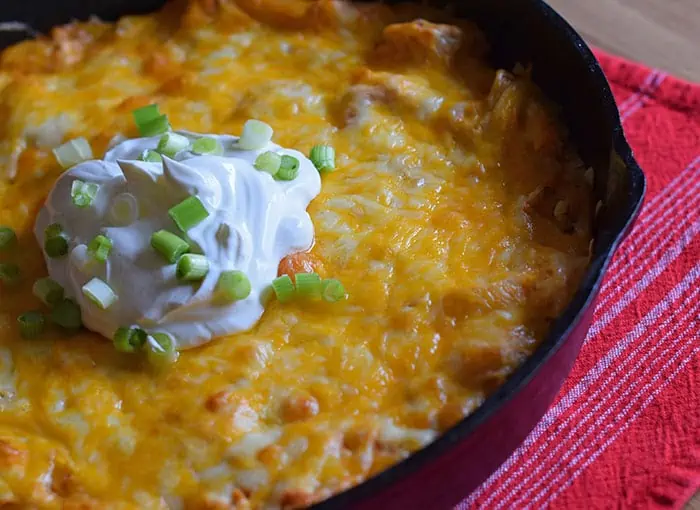 My family loves a good casserole, and this is one casserole recipe to add to the list of recipes to try. Whether you love chicken recipes, enchiladas, or any type of Mexican food, this turkey enchilada casserole is a delicious skillet casserole that can be made with either turkey or chicken. Add it to the list of simple and easy dinner recipes.