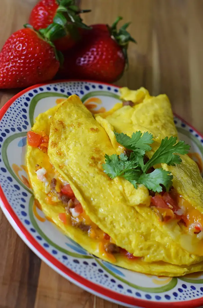 An omelette breakfast is a family favorite. How to make Tex-Mex omelettes using tenderloin tips, vegetables, and cheeses. Breakfast just got tastier than ever.