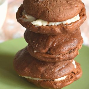 stack of chocolate whoopie pies on green Texas Ware saucer plate
