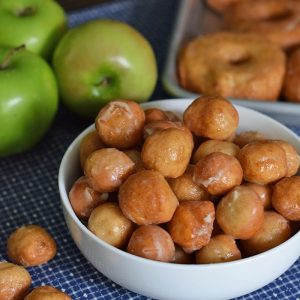 Caramel Apple Donut Holes are the perfect fall treat, coated with a Krispy Kreme copycat like icing that’s flaky and oh so scrumptious.
