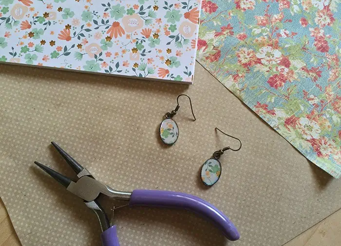 Love finding Mod Podge ideas? Me too! Here’s an easy tutorial for making your own DIY earrings with Mod Podge Dimensional Magic and scrapbook paper. Homemade jewelry with your own special touch!