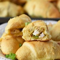 leftover turkey stuffing crescent rolls with green onions on a white plate, easy party appetizers