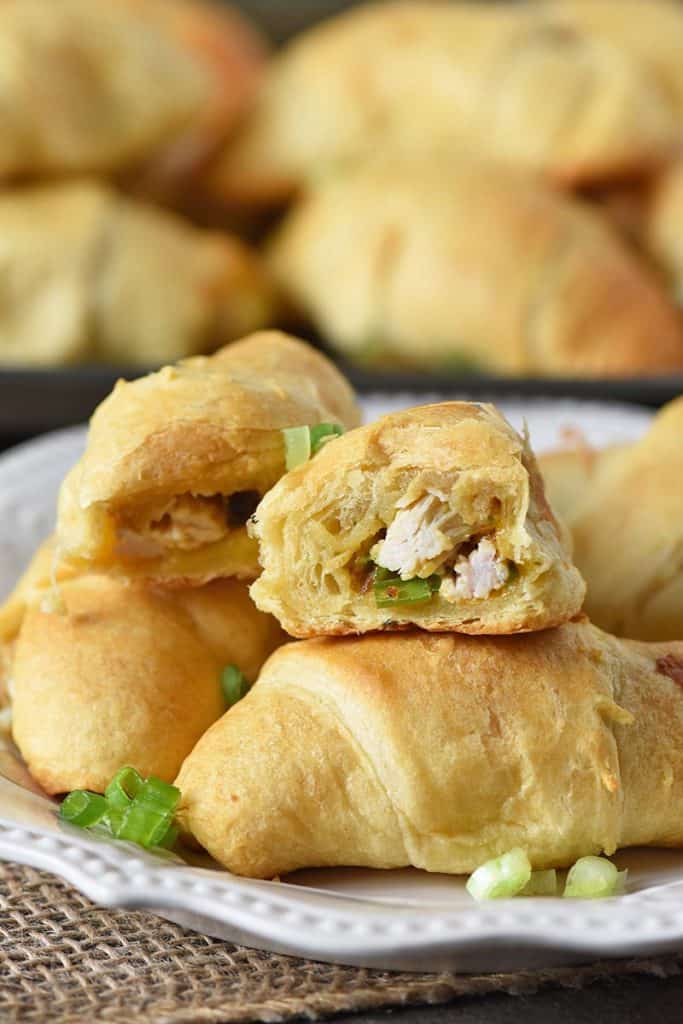 leftover turkey stuffing crescent rolls with green onions on a white plate, easy party appetizers