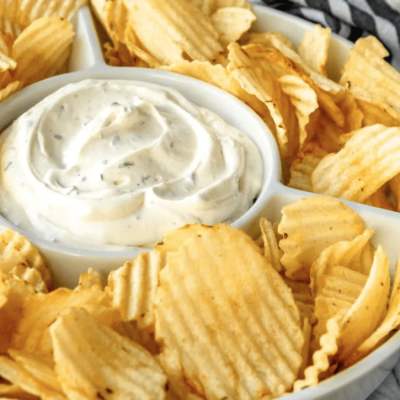 potato chip dip in white serving tray with potato chips