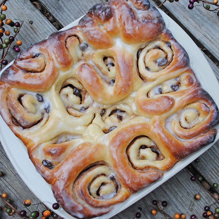 Cozy up with the best most scrumptious cinnamon rolls recipe ever! My mom taught me how to make these cinnamon rolls. This recipe also happens to be my grandma's bread rolls recipe with just a few extra steps added to make cinnamon rolls. Homemade cinnamon rolls make the perfect breakfast treat, especially on a cold day when it's nice and warm inside.