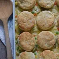 Chicken Pot Pie with biscuits, filled with a medley of vegetables in a creamy delicious sauce, seasoned with sage. Ultimate comfort food dinner recipe.