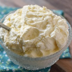 Homemade whipped cream can be made in 5 minutes with this easy recipe. Only 4 ingredients to a creamy delicious topping for all your favorite desserts.