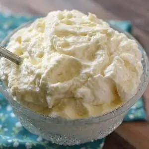 Homemade whipped cream can be made in 5 minutes with this easy recipe. Only 4 ingredients to a creamy delicious topping for all your favorite desserts.