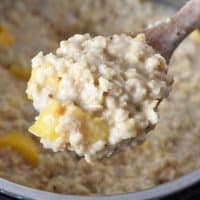 wooden spoonful of peaches and cream Instant Pot oatmeal