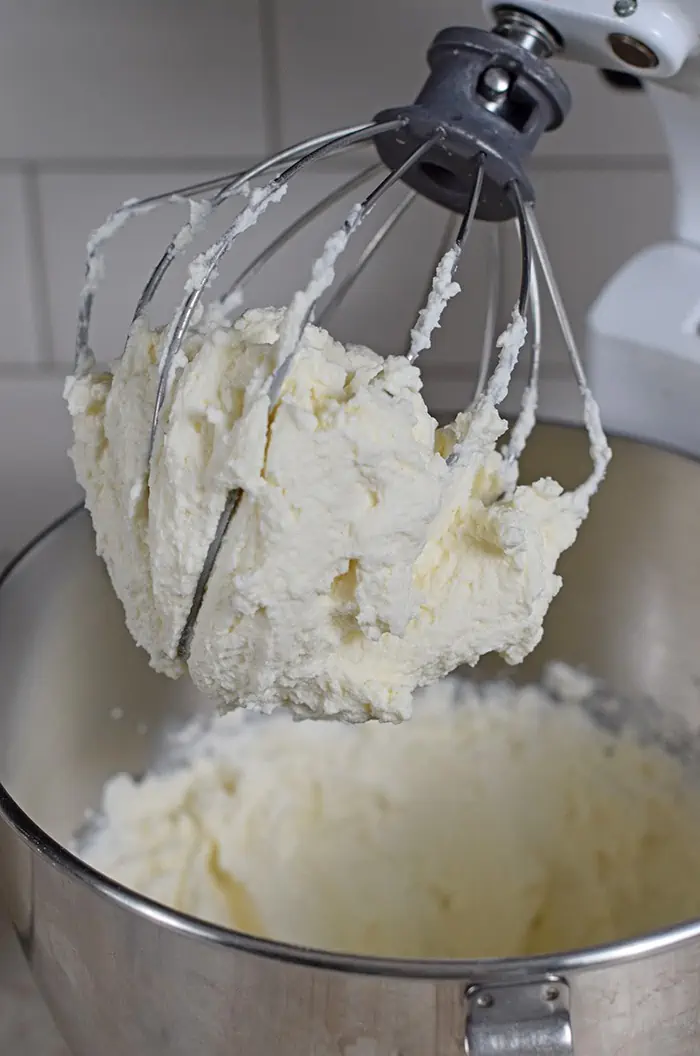 Whip up a batch of homemade whipped cream in 5 minutes with this quick and easy recipe. 4 ingredients and you’ve got a creamy delicious topping for all your favorite desserts.