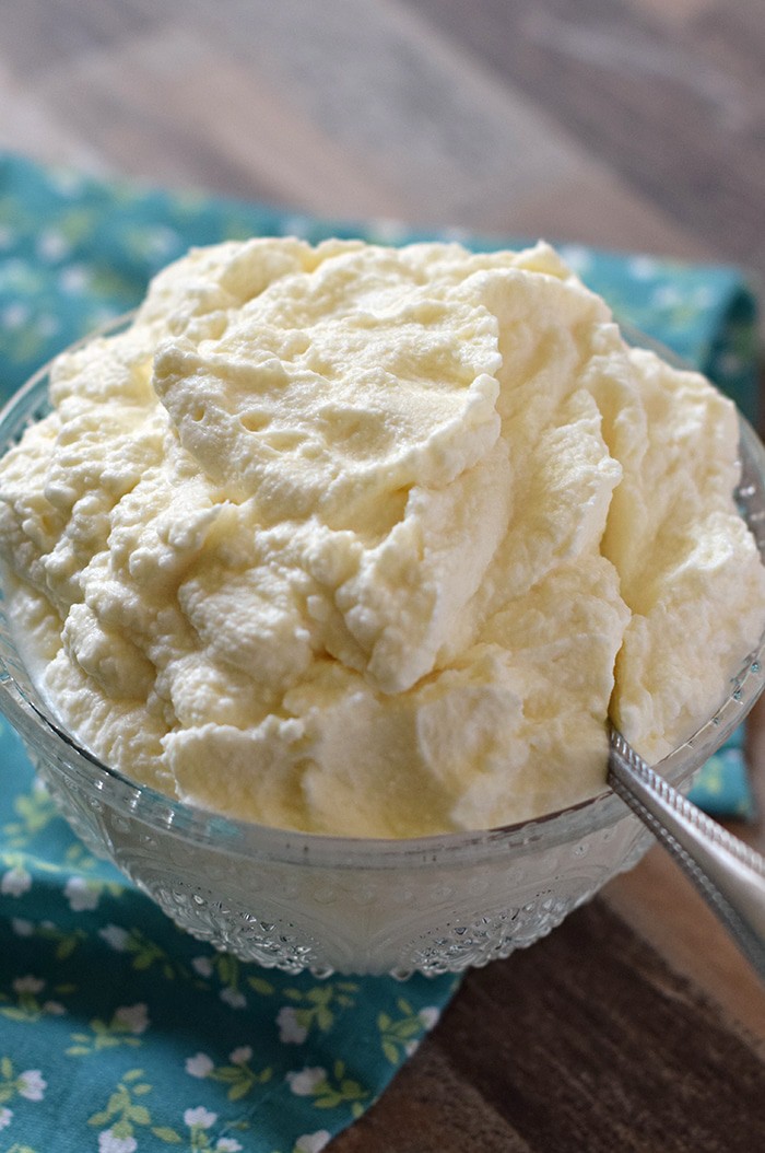 Mix together a batch of homemade whipped cream in 5 minutes with this quick and easy recipe using only 4 ingredients. Makes a creamy delicious topping for all your favorite desserts.