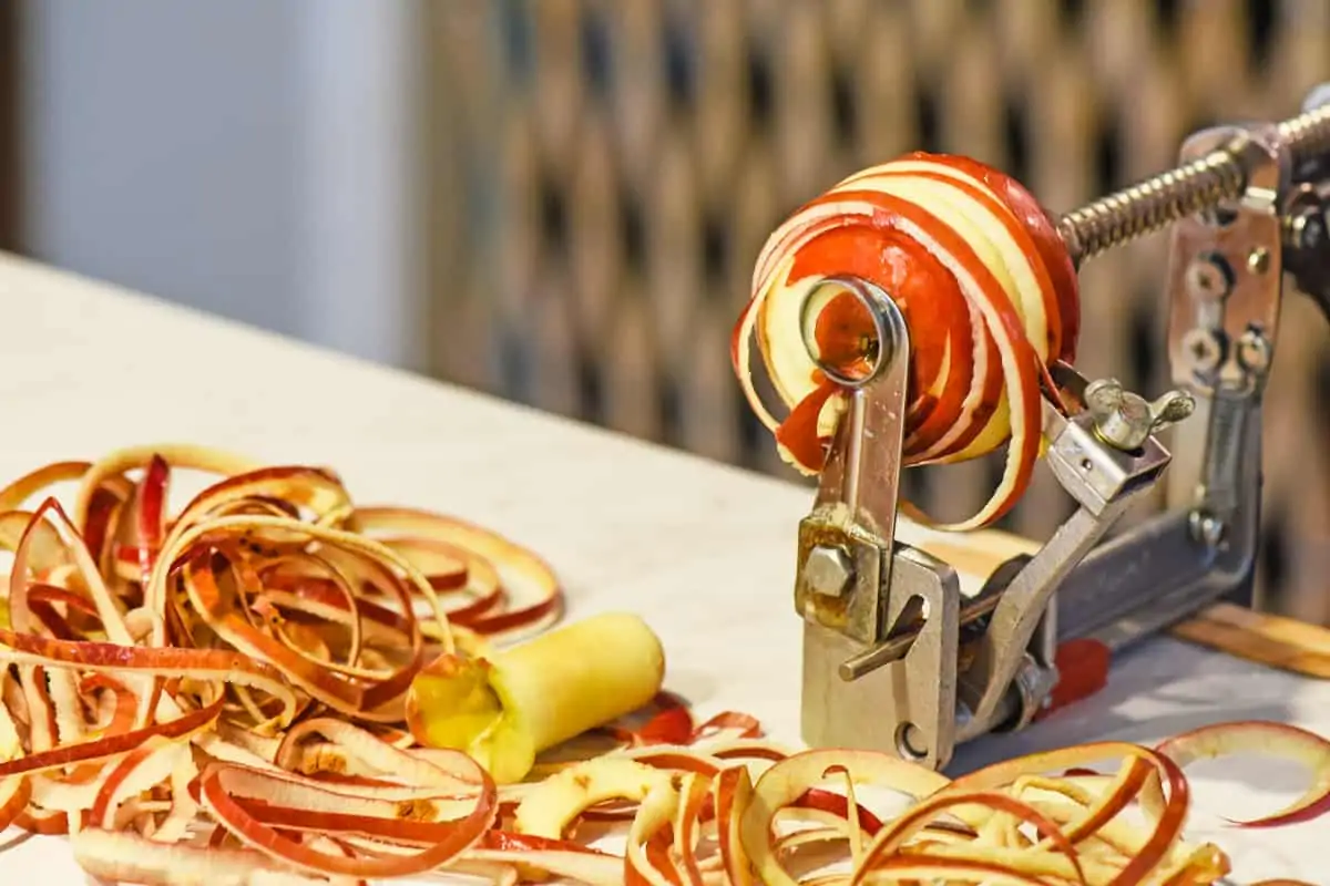peeling and coring apples for apple butter with a clamping Johnny apple peeler
