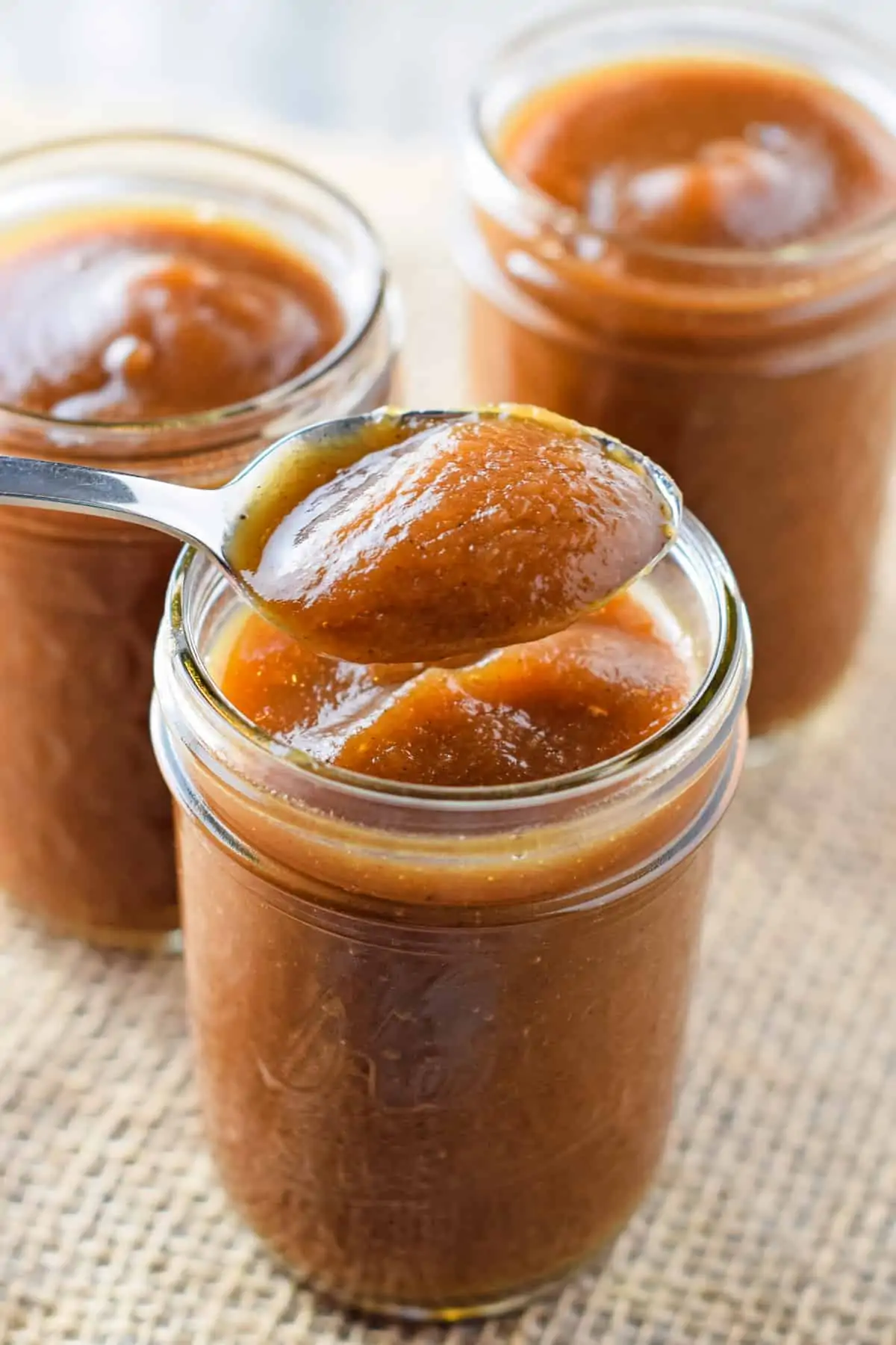 spoonful of pressure cooker apple butter from canning jar