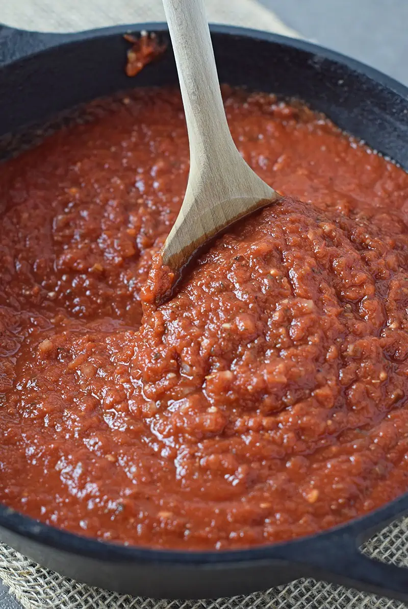 Homemade Pasta Sauce you can make ahead and freeze. Simple, quick, and easy recipe perfect for spaghetti. I love it with meat, but it’s good meatless too.