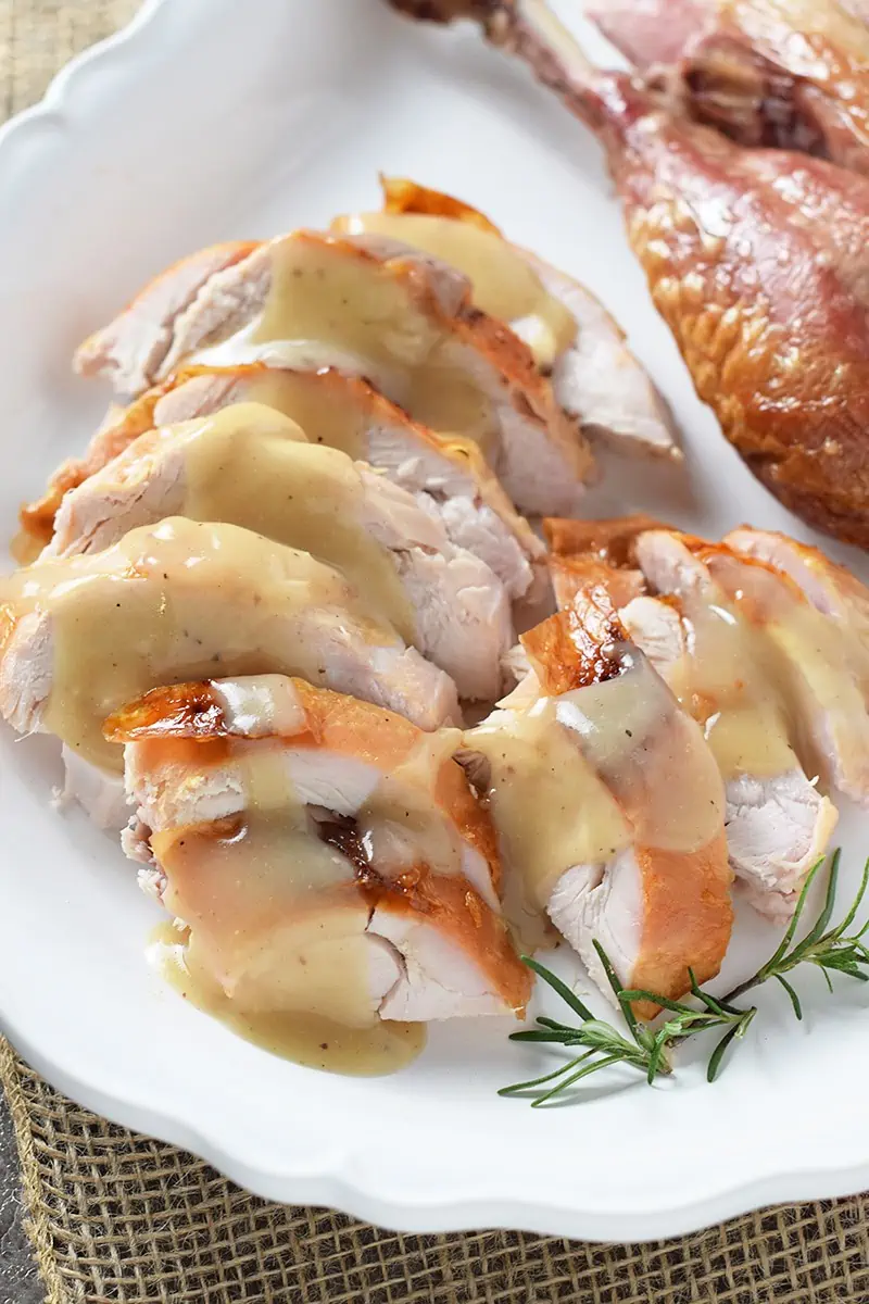 How to brine and roast a deliciously moist turkey that’s perfect for family meals and holiday dinners like Thanksgiving. Maple Bourbon Brined Roasted Turkey is so full of flavor!