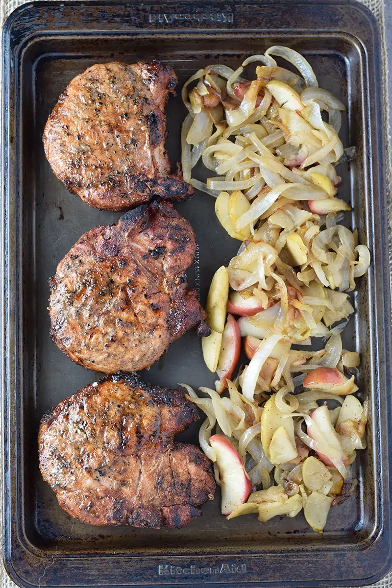 I love it when my husband grills dinner. Maple Pork Chops with Apples and Onions do not disappoint. Delicious family dinner idea!