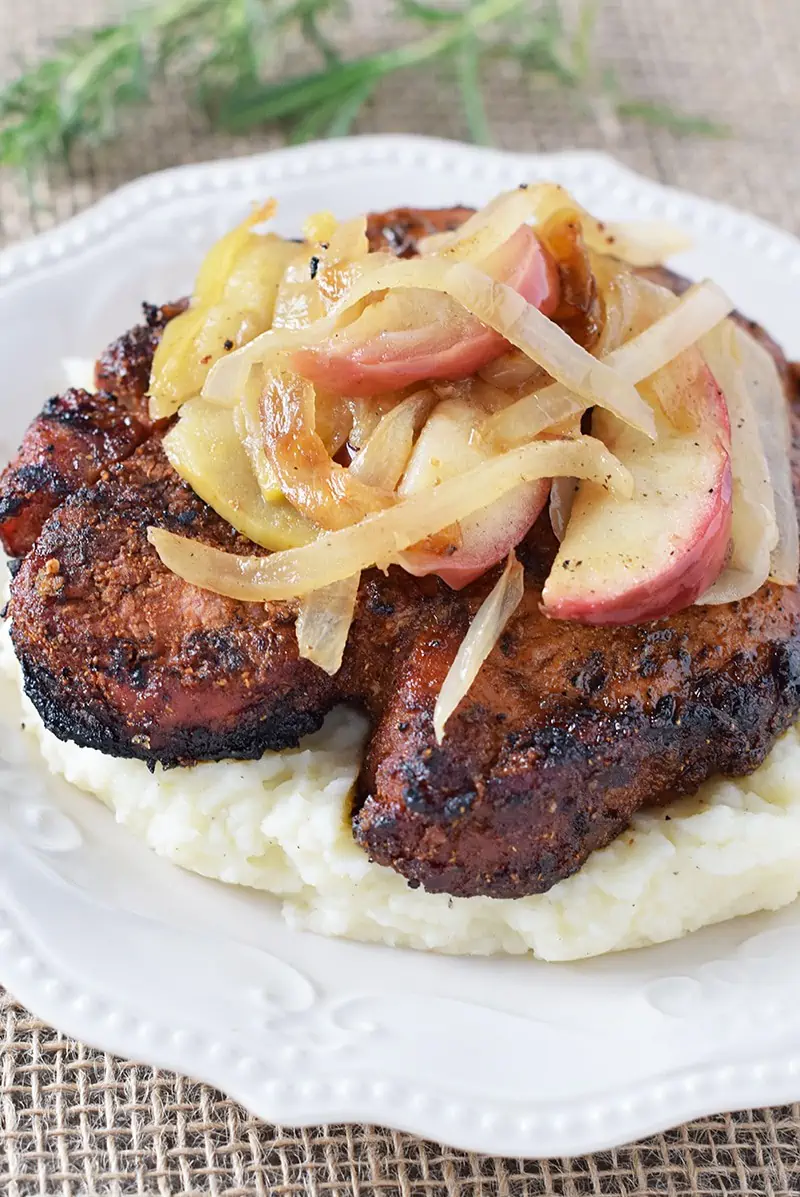 Sometimes it does the soul good to go back to our roots with a good old-fashioned meal of meat and potatoes, like Maple Pork Chops with Apples and Onions.