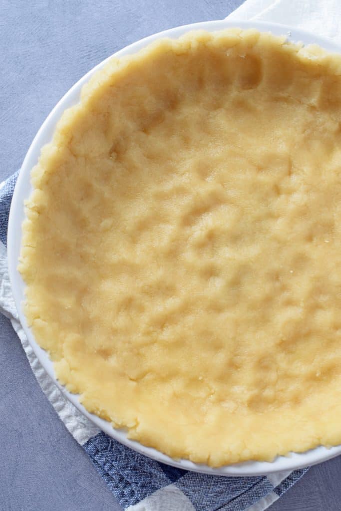 How to make a pie crust that’s so easy it’s a no-fail crust. Mix it up and press it into your pie plate. Easy Shortcut No-Roll Pie Crust!