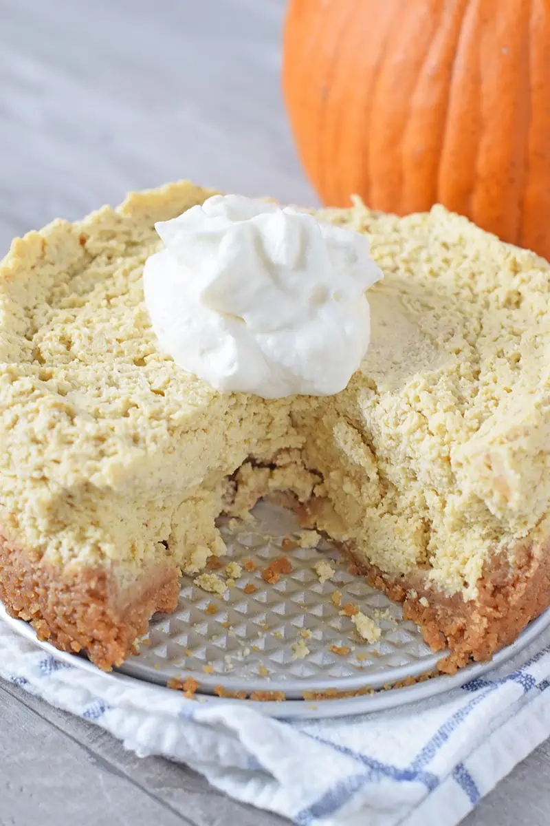 Easy recipe for Instant Pot Pumpkin Spice Cheesecake, a deliciously creamy fall and holiday dessert with all the flavors of fall.