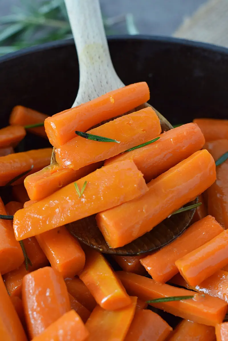 Make a delicious side dish the whole family will love, Honey Glazed Carrots. Just 4 simple ingredients, and they’re so easy to make, perfect for dinner.