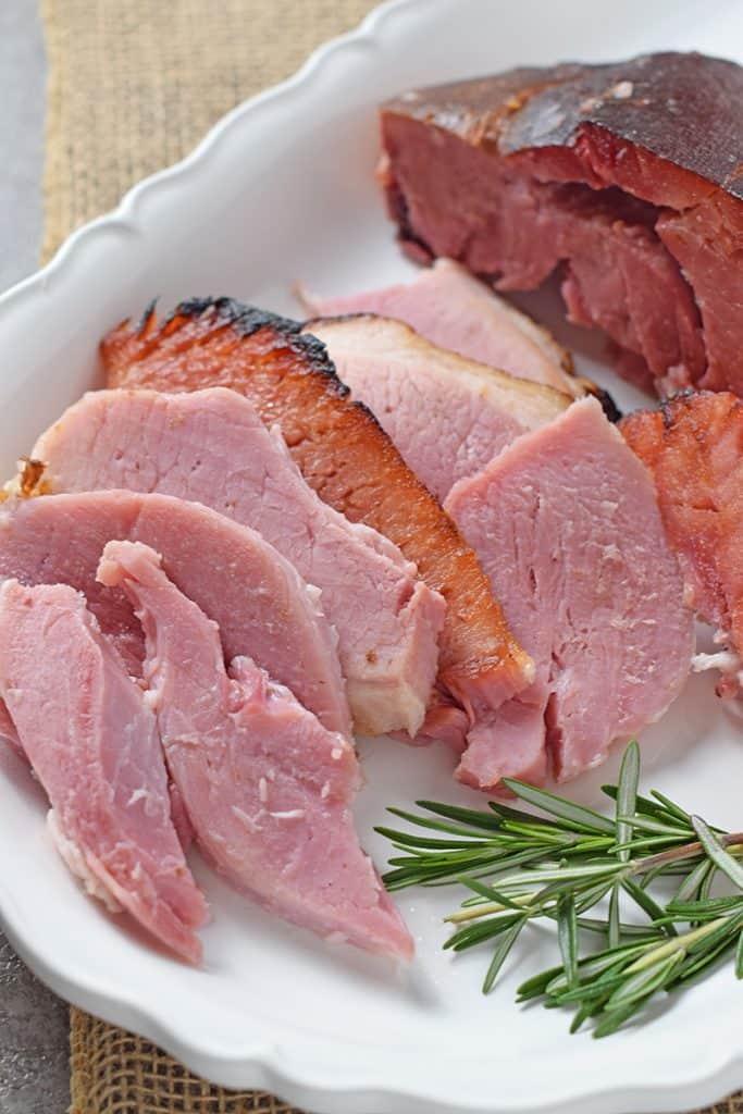 Pineapple Honey Glazed Ham, perfect for a weeknight meal or a holiday celebration. Delicious sweet and salty recipe.