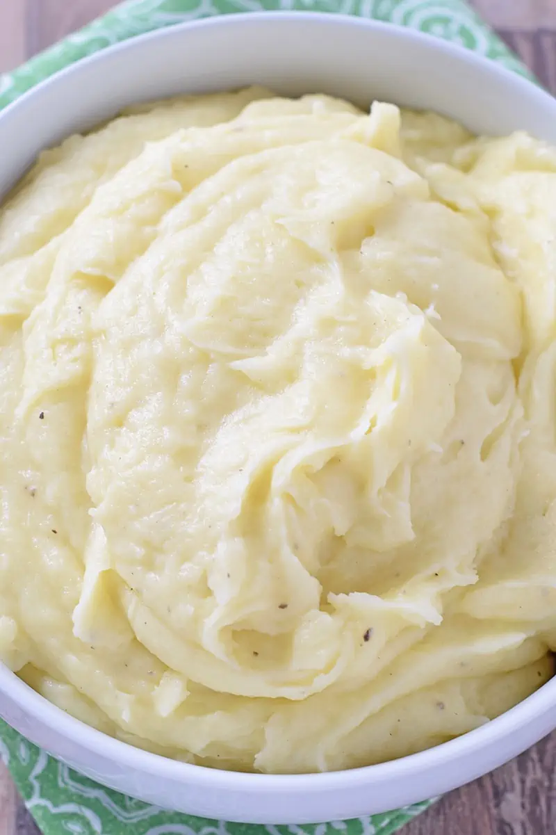 Creamy Mashed Potatoes are a delicious side with weeknight meals or special holiday dinners. They’re the quintessential side dish recipe to pair with turkey, ham, roast, chicken, and all the fixings!