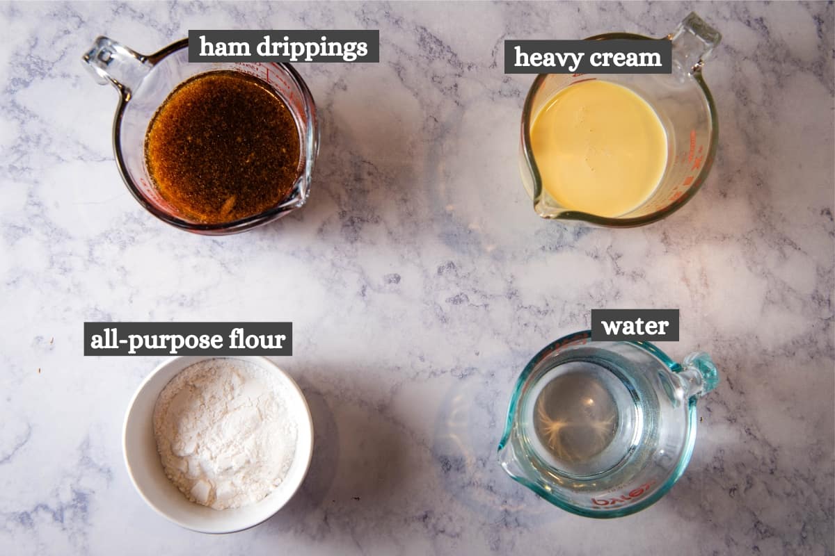 ham gravy ingredients on white marble countertop