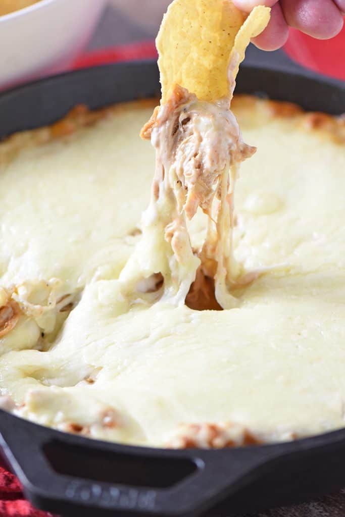 BBQ Chicken Dip, made with cream cheese, is an easy appetizer recipe. Pair it with tortilla chips for a delicious snack your friends and family will love!