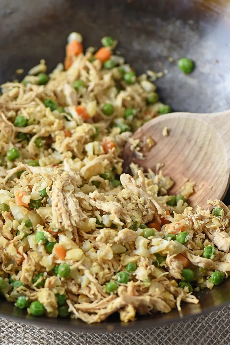 Looking for a low carb alternative to traditional chicken fried rice? Make Cauliflower Chicken Fried Rice instead. It’s delicious, healthier, and such an easy recipe to make.