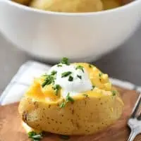 Instant Pot Baked Potatoes are pressure cooked in less than 10 minutes. Easy to make, they’re a delicious dinner side dish the whole family will love!