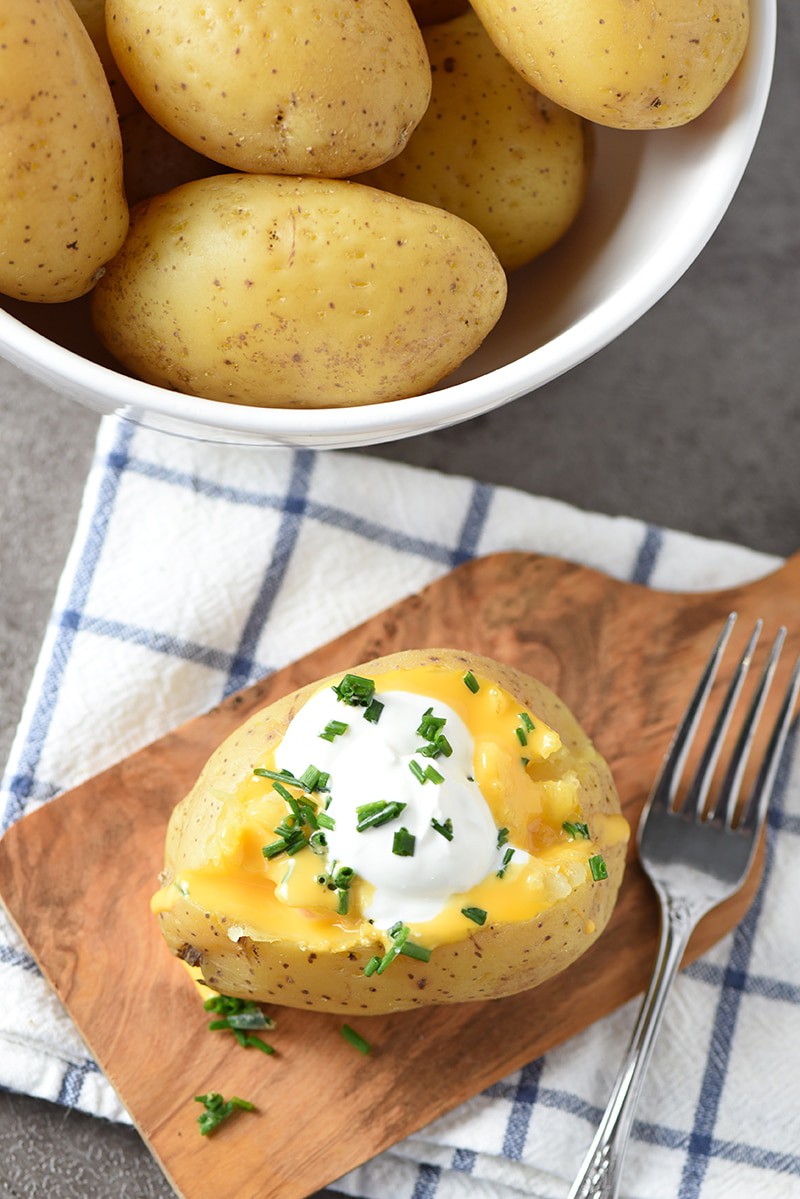 How to make the most delicious, moist, tender Instant Pot Baked Potatoes. They’re so good! They make an easy side dish for dinner.