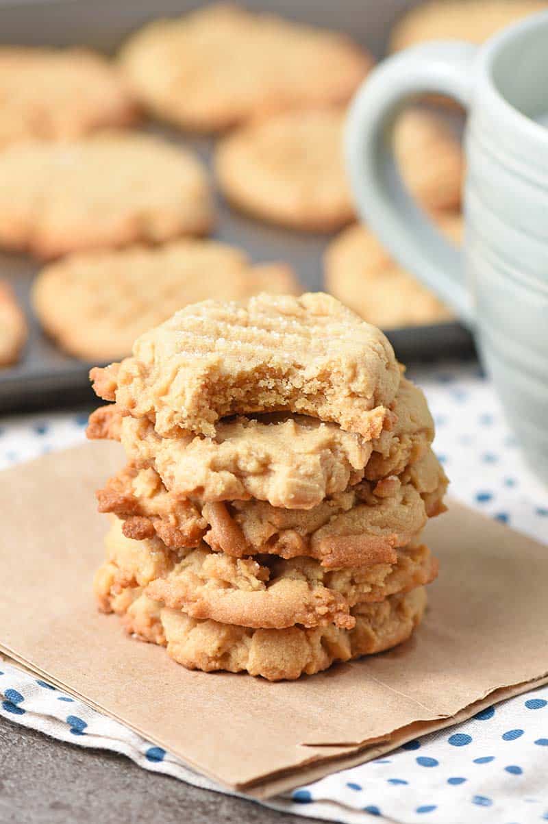 Chewy peanut butter cookies stack with a bite taken out