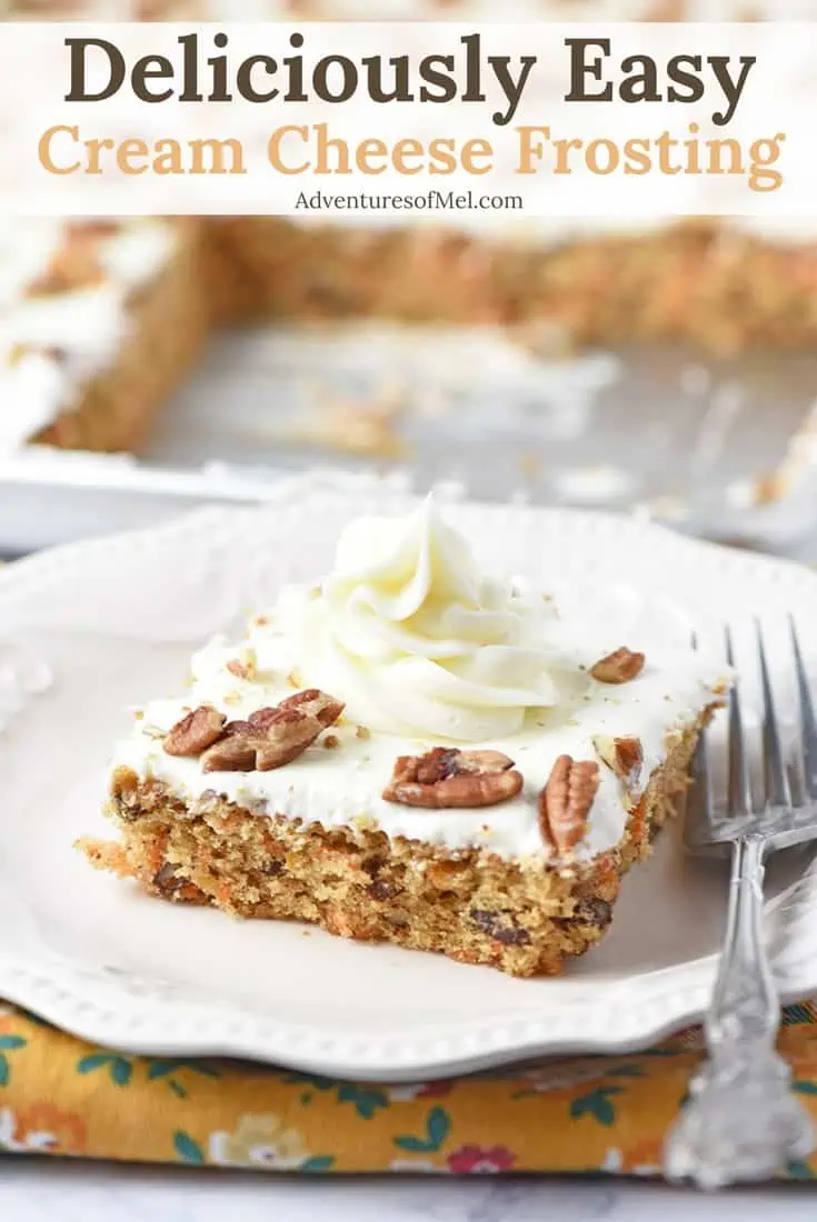 easy cream cheese frosting on slice of carrot cake on white plate with fork