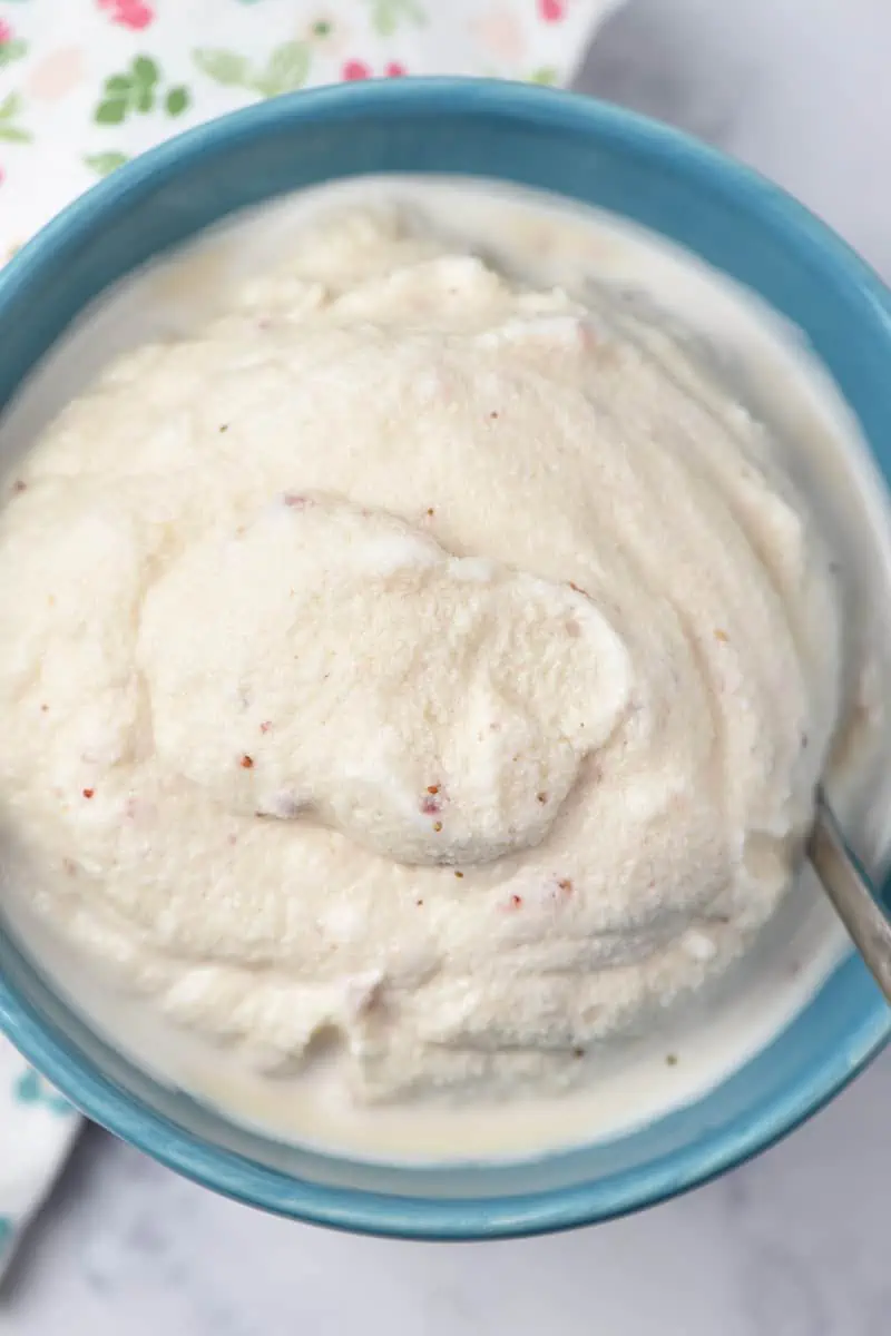 close up bowl of homemade strawberry ice cream