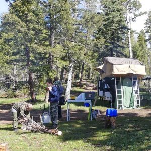 dispersed camping in New Mexico with gear from our camping checklist, including a rooftop tent and camp trailer