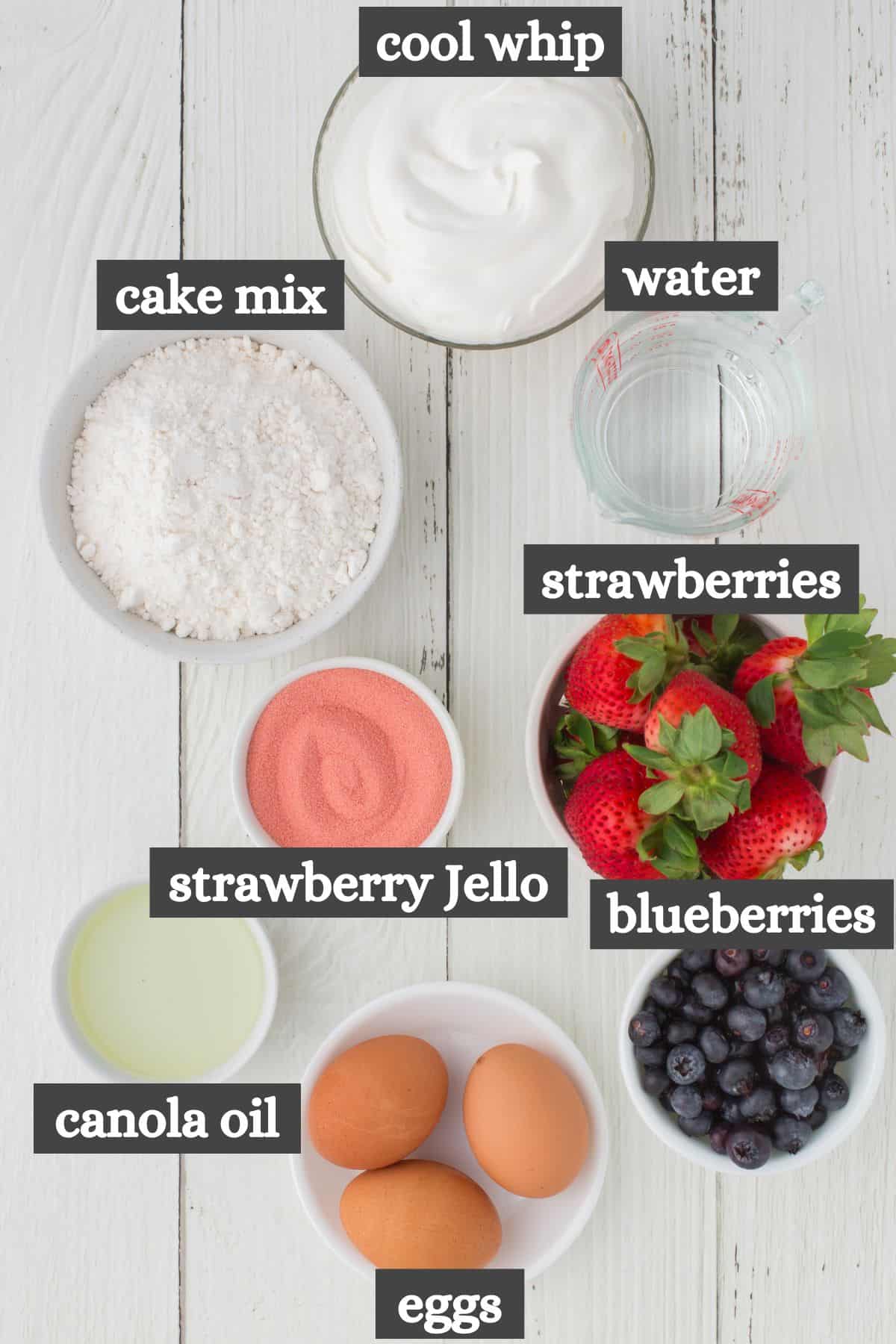 strawberry Jello American flag cake ingredients lined out on a white countertop